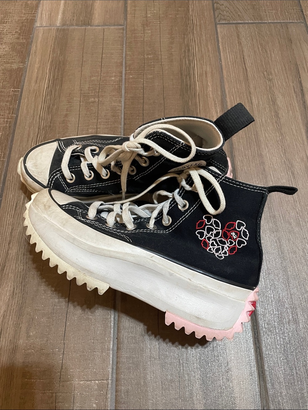 Converse Black High-Top Platform Sneakers with Cream Laces and Pink Heel Accent